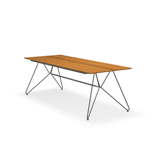 Rektangulært spisebord med bambusplade og metalstel. Enkel og moderne stil.
