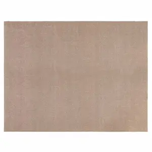 Tæppe i lys beige med ensartet farve og tyk tekstur. Sort, tekstureret underside.