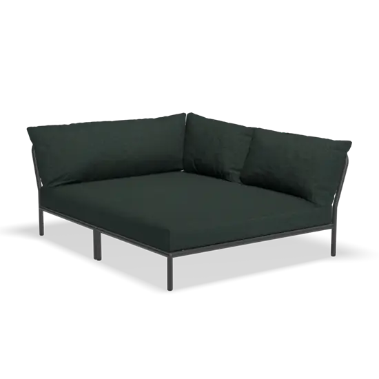 Mørkegrøn hjørnesofa i stof med minimalistisk sort metalramme og bløde puder.