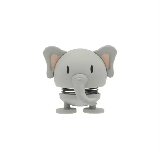 Grå elefantfigur med store ører, snabel og fjeder mellem top og bund.