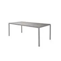 Minimalistisk og moderne rektangulært bord med enkle ben og en glat, neutralfarvet bordplade.