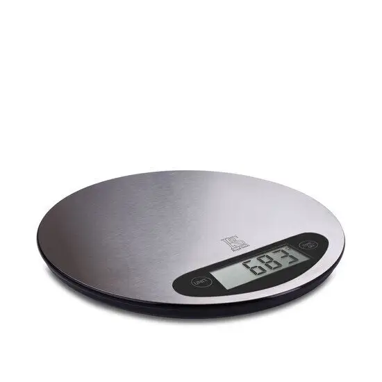 Rund køkkenvægt i rustfrit stål med digital skærm, viser 683 gram.