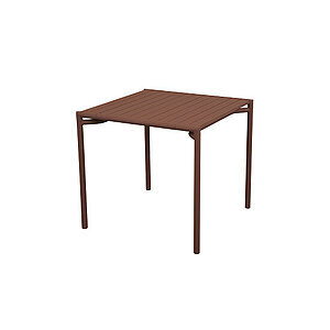 Brunt spisebord med flad bordplade og fire ben, moderne design i aluminium.