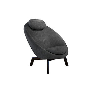 Mørkegrå loungestol med buet form, fire vinklede ben og nakkepude.