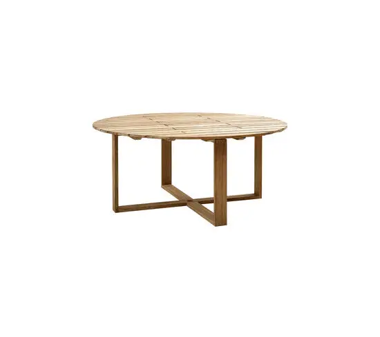 Rundt teak spisebord med lamelbordplade og krydsende benramme for robust støtte.