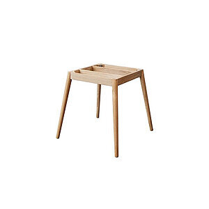 Rundt spisebord med teaktræsoverflade og fire lige ben.