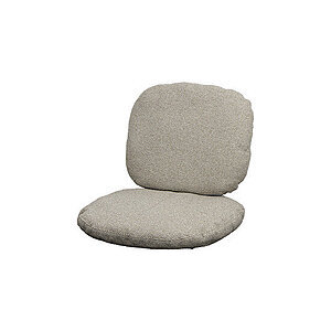 Lysebrun sæde- og ryghynde med tekstureret stof. Designet er blødt og komfortabelt til siddebrug.