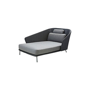 Daybed med højre ryglæn, slanke ben og grå hynder, herunder ryg- og sædehynder, i grafitfarve.