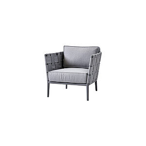 Moderne lysgrå loungestol med vævede paneler og slanke ben, inkl. matchende hyndesæt.