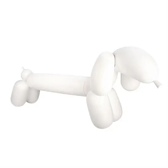 Hvid bænk med rund, sjovt design som ligner en ballonfigur.