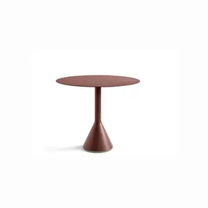 Rundt bord med konisk fod i jernrød. Minimalistisk design med glat overflade.
