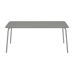 Rektangulært spisebord med glat granitgrå overflade og slanke ben.
