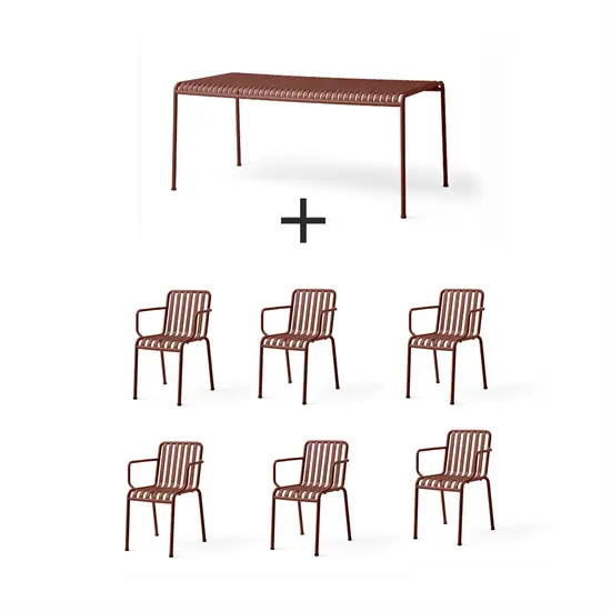 Sæt med bord og seks armstole i jernrød, slattedesign, velegnet til udendørs brug.