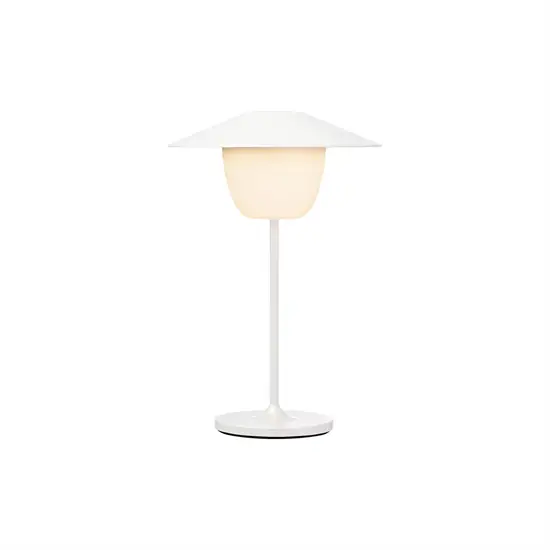 Minimalist hvid LED-lampe med bred top, slank stamme og cirkulær base.