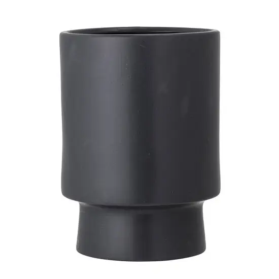 Sort, cylindrisk urtepotteskjuler i stentøj med moderne mat finish og lige linjer.