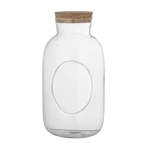 Klar glasbeholder med rund korklåg og let buet hals, synlig indvendigt.