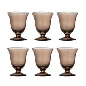 Seks brune vinglas med bred skål og kort stilk, arrangeret i to rækker.