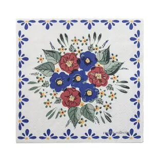 Serviet med røde og blå blomster, grønne blade, blå/gul kantmønster, "creative collection" tekst.