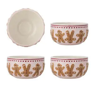 Skål med peberkagemænd og røde hjerter på ydersiden, lys inderside og let bølget kant.