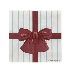 Serviet med rød sløjfe og lyseblå striber. "Bloomingville" står i nederste højre hjørne.