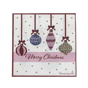 Juletema serviet med fire julekugler og "Merry Christmas". Hvid baggrund med gyldne prikker.