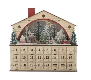 Husformet julekalender med vinterlandskab, træer, dyr og 24 nummererede skuffer nederst.