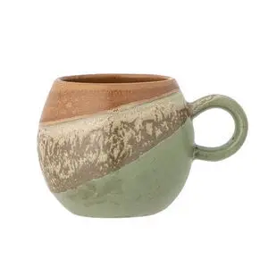 Rund grøn kop med lille hank, brun og beige gradient samt tekstureret overflade.