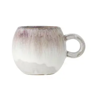 Rund keramikkop med hvid-rosa gradient og tekstureret overflade.