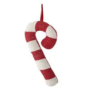 Ornament formet som slikstok med røde/hvide striber og solid rød bagside, rød hængestrop øverst.