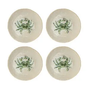 Fire runde tallerkener med grønt krabbe-design i midten og let ujævne kanter.