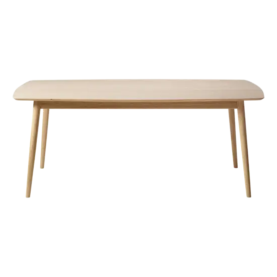 Rektangulært spisebord i lys træ med afrundede kanter og slanke, tilspidsede ben.