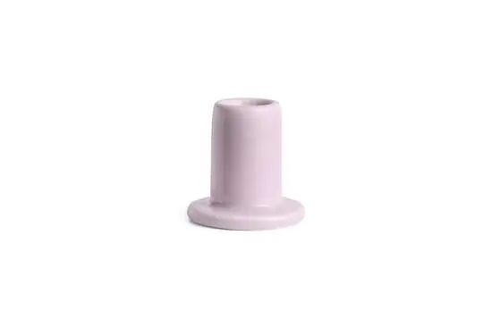 Lyseholder med cylinderformet top og rund base i lys rosa farve.