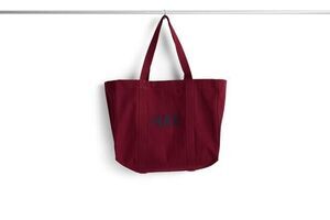 Medium burgunder shopper taske med synlige sømme og "HAY" trykt på forsiden.