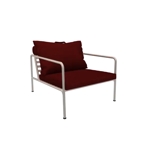 Stol med hvidt stel og røde puder, moderne design.