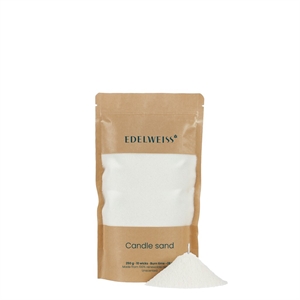 Brun pose med klar sektion viser hvidt sandlys med tekst "Edelweiss Candle sand."