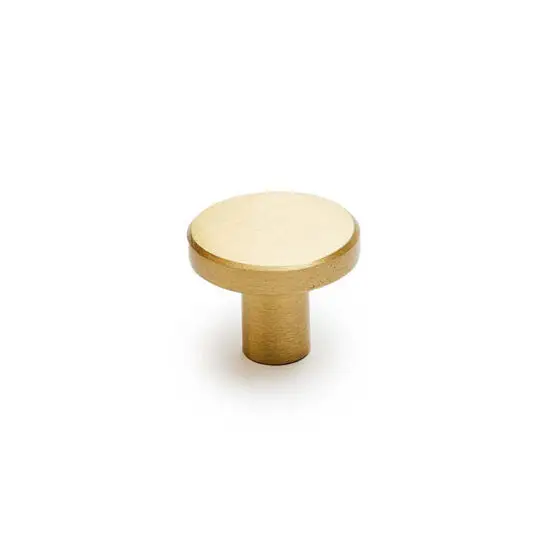 Rund knage med børstet finish, enkel og elegant design. Cylindrisk base, flad top.