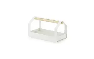 Normann Copenhagen Haus Toolbox i lys grå med rektangulær form og træhåndtag.