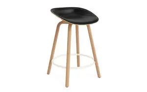 Sort sæde, bøgeben, hvid fodstøtte. Normann Copenhagen barstol 65 cm.