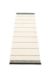 Rektangulært tæppe med sorte og hvide striber og faste sorte kanter, 60x200 cm.