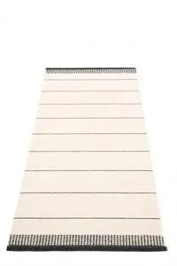 Tæppe med sorte og hvide striber, sorte kanter med lodrette linjer, 85x200 cm.