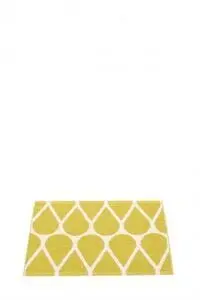 Sennepsgul måtte med hvide dråbeformer i geometrisk mønster, størrelse 70x50 cm.