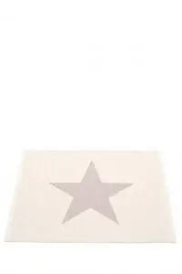 Rektangulær måtte med stjerne i midten, vendbart design i lyserød og lysere nuancer.