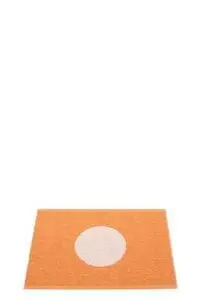 Rektangulær Pappelina-måtte i bleg orange med central perle-pink cirkel, reversibelt design.