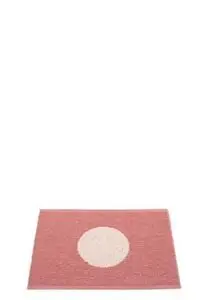 Rektangulært tæppe i blush pink med stor central cirkel i perle pink.