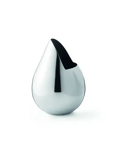 Skinnende, afrundet mælke- og sukkerspreder med åbning til dosering, elegant og reflekterende.