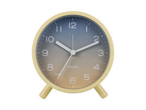 Rundt vækkeur med blå-gul gradient urskive, gul ramme og ben, hvide tal og visere.