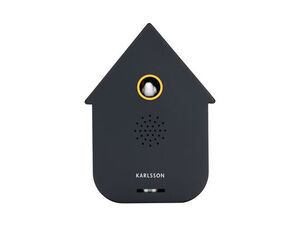 Husformet sort produkt med guldring og "KARLSSON" mærke på fronten.