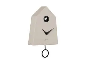 Vægur i husform, varm grå med sort pendul og kuk-åbning øverst.