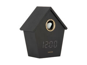 Sort vækkeur formet som fuglehus med LED-display "12:00", guld kant og teksten "KARLSSON".