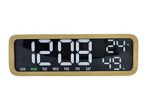 Træramme med hvidvasket finer, digitalt display med tid, dag, temperatur (24°C) og fugtighed (49%).